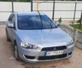 Серый Мицубиси Лансер, объемом двигателя 1.5 л и пробегом 175 тыс. км за 6000 $, фото 1 на Automoto.ua