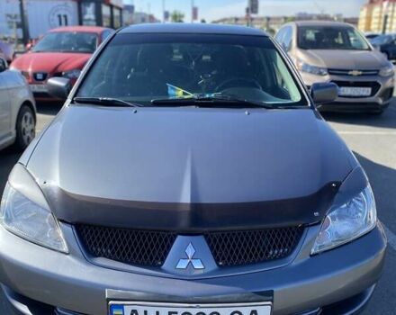 Сірий Міцубісі Lancer, об'ємом двигуна 1.6 л та пробігом 293 тис. км за 5000 $, фото 1 на Automoto.ua
