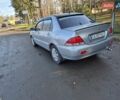 Сірий Міцубісі Lancer, об'ємом двигуна 1.58 л та пробігом 235 тис. км за 5200 $, фото 9 на Automoto.ua