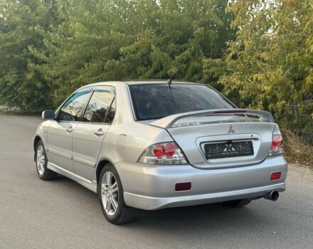 Серый Мицубиси Лансер, объемом двигателя 2 л и пробегом 185 тыс. км за 4600 $, фото 6 на Automoto.ua