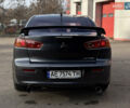 Сірий Міцубісі Lancer, об'ємом двигуна 2 л та пробігом 220 тис. км за 6800 $, фото 1 на Automoto.ua