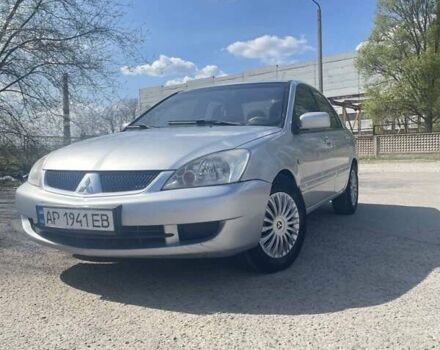 Сірий Міцубісі Lancer, об'ємом двигуна 1.58 л та пробігом 248 тис. км за 4999 $, фото 3 на Automoto.ua