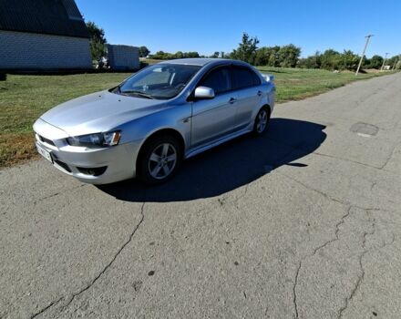 Серый Мицубиси Лансер, объемом двигателя 2 л и пробегом 224 тыс. км за 5500 $, фото 3 на Automoto.ua