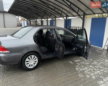 Сірий Міцубісі Lancer, об'ємом двигуна 1.6 л та пробігом 330 тис. км за 3500 $, фото 22 на Automoto.ua