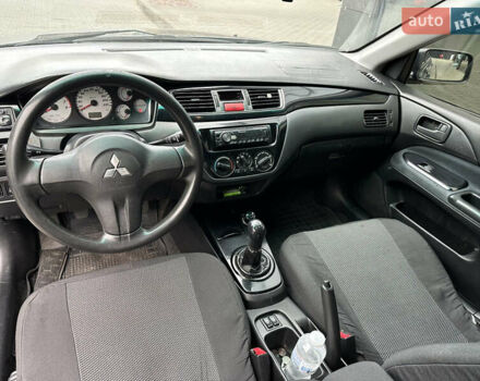 Сірий Міцубісі Lancer, об'ємом двигуна 1.6 л та пробігом 115 тис. км за 2800 $, фото 13 на Automoto.ua