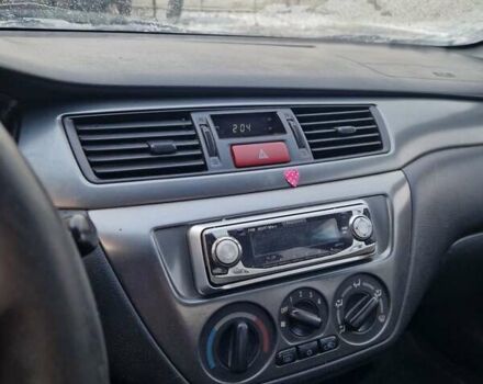 Сірий Міцубісі Lancer, об'ємом двигуна 1.6 л та пробігом 160 тис. км за 3800 $, фото 5 на Automoto.ua