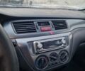 Сірий Міцубісі Lancer, об'ємом двигуна 1.6 л та пробігом 160 тис. км за 3800 $, фото 5 на Automoto.ua