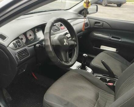 Серый Мицубиси Лансер, объемом двигателя 1.6 л и пробегом 181 тыс. км за 4500 $, фото 7 на Automoto.ua