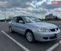 Сірий Міцубісі Lancer, об'ємом двигуна 1.59 л та пробігом 288 тис. км за 4500 $, фото 4 на Automoto.ua