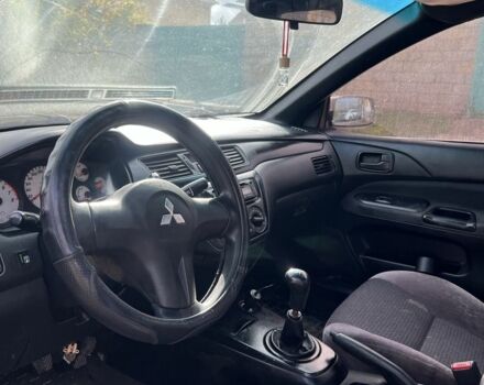 Серый Мицубиси Лансер, объемом двигателя 1.6 л и пробегом 200 тыс. км за 2300 $, фото 4 на Automoto.ua