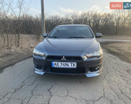 Серый Мицубиси Лансер, объемом двигателя 2 л и пробегом 205 тыс. км за 7000 $, фото 1 на Automoto.ua