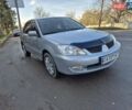 Сірий Міцубісі Lancer, об'ємом двигуна 1.58 л та пробігом 235 тис. км за 5200 $, фото 7 на Automoto.ua