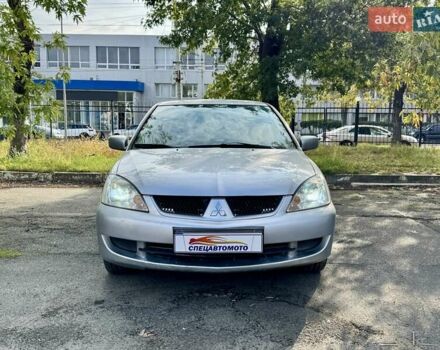 Сірий Міцубісі Lancer, об'ємом двигуна 1.58 л та пробігом 138 тис. км за 4990 $, фото 6 на Automoto.ua