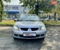 Сірий Міцубісі Lancer, об'ємом двигуна 1.58 л та пробігом 138 тис. км за 4990 $, фото 6 на Automoto.ua