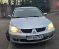 Сірий Міцубісі Lancer, об'ємом двигуна 1.6 л та пробігом 213 тис. км за 3600 $, фото 1 на Automoto.ua