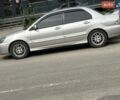 Сірий Міцубісі Lancer, об'ємом двигуна 2 л та пробігом 241 тис. км за 5000 $, фото 1 на Automoto.ua