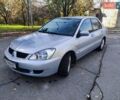 Сірий Міцубісі Lancer, об'ємом двигуна 1.58 л та пробігом 122 тис. км за 6300 $, фото 8 на Automoto.ua