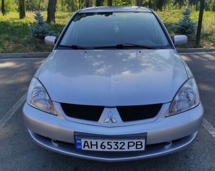 Серый Мицубиси Лансер, объемом двигателя 1.6 л и пробегом 187 тыс. км за 4500 $, фото 2 на Automoto.ua