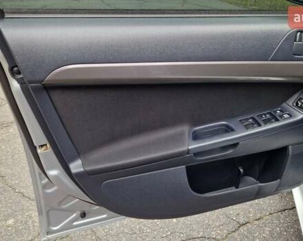 Серый Мицубиси Лансер, объемом двигателя 2 л и пробегом 213 тыс. км за 6550 $, фото 10 на Automoto.ua