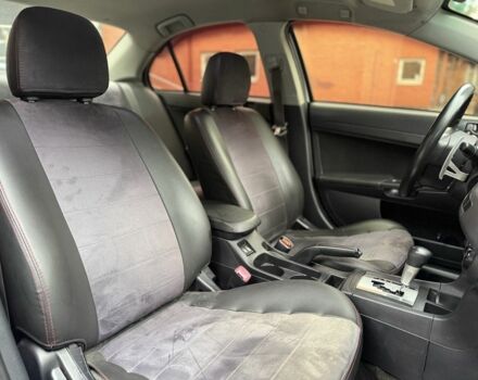 Сірий Міцубісі Lancer, об'ємом двигуна 2 л та пробігом 220 тис. км за 6400 $, фото 10 на Automoto.ua