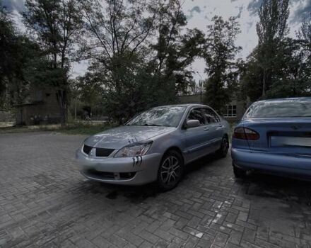 Сірий Міцубісі Lancer, об'ємом двигуна 1.6 л та пробігом 213 тис. км за 3800 $, фото 2 на Automoto.ua