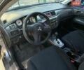 Сірий Міцубісі Lancer, об'ємом двигуна 1.58 л та пробігом 288 тис. км за 4300 $, фото 1 на Automoto.ua
