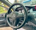 Серый Мицубиси Лансер, объемом двигателя 1.6 л и пробегом 138 тыс. км за 4490 $, фото 18 на Automoto.ua