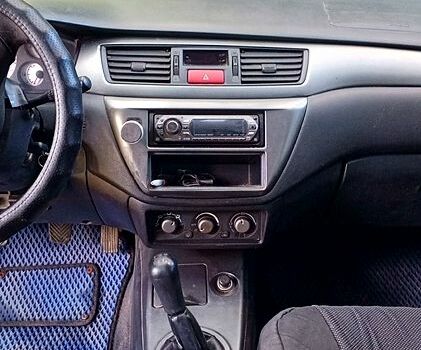 Сірий Міцубісі Lancer, об'ємом двигуна 1.6 л та пробігом 300 тис. км за 4400 $, фото 6 на Automoto.ua