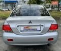 Сірий Міцубісі Lancer, об'ємом двигуна 1.58 л та пробігом 138 тис. км за 4990 $, фото 15 на Automoto.ua