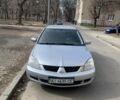 Сірий Міцубісі Lancer, об'ємом двигуна 1.6 л та пробігом 332 тис. км за 3200 $, фото 4 на Automoto.ua