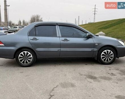 Сірий Міцубісі Lancer, об'ємом двигуна 1.6 л та пробігом 270 тис. км за 4300 $, фото 1 на Automoto.ua
