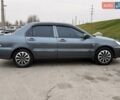 Сірий Міцубісі Lancer, об'ємом двигуна 1.6 л та пробігом 270 тис. км за 4300 $, фото 1 на Automoto.ua