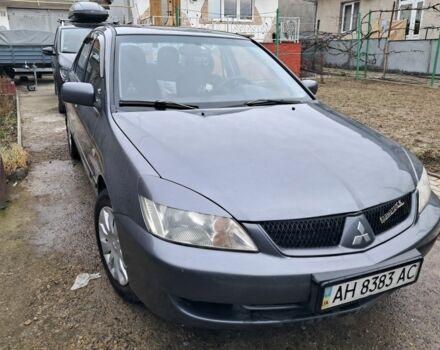 Сірий Міцубісі Lancer, об'ємом двигуна 0.16 л та пробігом 252 тис. км за 3600 $, фото 2 на Automoto.ua