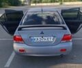 Серый Мицубиси Лансер, объемом двигателя 1.6 л и пробегом 260 тыс. км за 4100 $, фото 1 на Automoto.ua