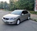 Сірий Міцубісі Lancer, об'ємом двигуна 2 л та пробігом 293 тис. км за 3999 $, фото 1 на Automoto.ua