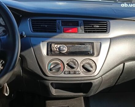 Сірий Міцубісі Lancer, об'ємом двигуна 1.6 л та пробігом 222 тис. км за 3990 $, фото 25 на Automoto.ua