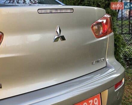 Серый Мицубиси Лансер, объемом двигателя 2 л и пробегом 282 тыс. км за 5450 $, фото 40 на Automoto.ua