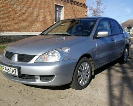 Сірий Міцубісі Lancer, об'ємом двигуна 1.6 л та пробігом 142 тис. км за 4700 $, фото 2 на Automoto.ua