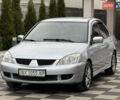 Сірий Міцубісі Lancer, об'ємом двигуна 1.6 л та пробігом 281 тис. км за 3999 $, фото 5 на Automoto.ua