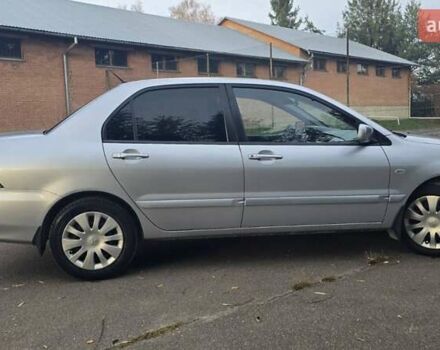 Сірий Міцубісі Lancer, об'ємом двигуна 1.6 л та пробігом 213 тис. км за 3600 $, фото 7 на Automoto.ua