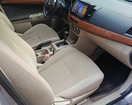 Серый Мицубиси Лансер, объемом двигателя 1.5 л и пробегом 268 тыс. км за 5944 $, фото 6 на Automoto.ua