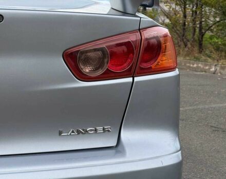 Серый Мицубиси Лансер, объемом двигателя 2 л и пробегом 207 тыс. км за 5800 $, фото 11 на Automoto.ua