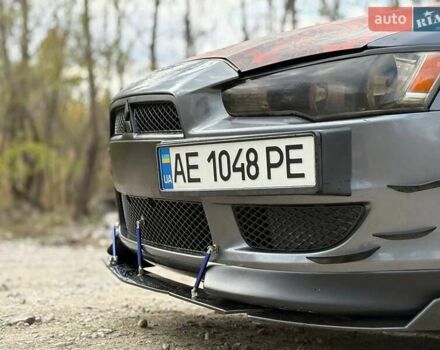 Сірий Міцубісі Lancer, об'ємом двигуна 1.5 л та пробігом 222 тис. км за 4999 $, фото 1 на Automoto.ua