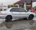 Серый Мицубиси Лансер, объемом двигателя 1.6 л и пробегом 300 тыс. км за 3250 $, фото 1 на Automoto.ua