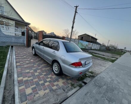 Сірий Міцубісі Lancer, об'ємом двигуна 0.16 л та пробігом 217 тис. км за 4200 $, фото 4 на Automoto.ua