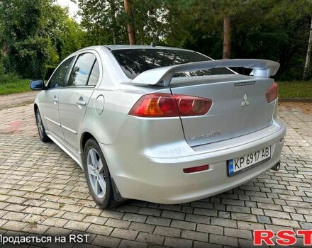Серый Мицубиси Лансер, объемом двигателя 2 л и пробегом 250 тыс. км за 6000 $, фото 2 на Automoto.ua