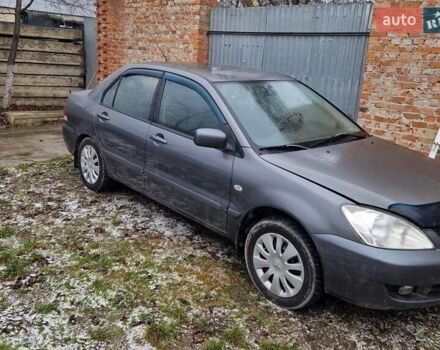 Сірий Міцубісі Lancer, об'ємом двигуна 1.6 л та пробігом 160 тис. км за 3800 $, фото 3 на Automoto.ua