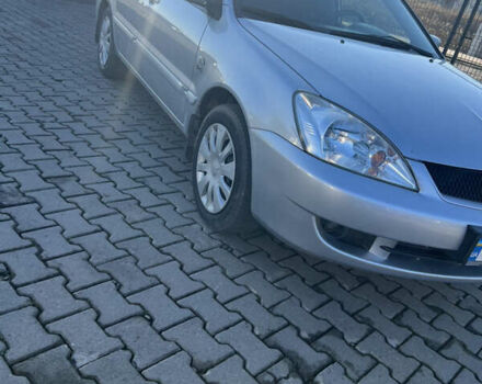 Серый Мицубиси Лансер, объемом двигателя 1.58 л и пробегом 178 тыс. км за 3300 $, фото 6 на Automoto.ua