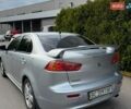 Серый Мицубиси Лансер, объемом двигателя 2 л и пробегом 220 тыс. км за 5999 $, фото 3 на Automoto.ua