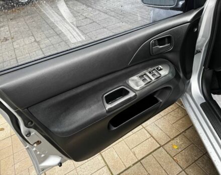 Серый Мицубиси Лансер, объемом двигателя 1.6 л и пробегом 205 тыс. км за 5300 $, фото 6 на Automoto.ua